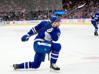Toronto Maple Leafs centre Auston Matthews (34) takes a shot during second period NHL hockey action against the Detroit Red Wings, in Toronto, Saturday, April 13, 2024. THE CANADIAN PRESS/Frank Gunn