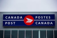 An increase in the cost to send a letter in Canada took effect Monday. The cost of stamps purchased in a booklet, coil or pane is now 99 cents per stamp, an increase of seven cents. The Canada Post logo is seen in Richmond, B.C., on Thursday, June 1, 2017. THE CANADIAN PRESS/Darryl Dyck