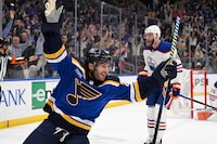 Apr 1, 2024; St. Louis, Missouri, USA; St. Louis Blues left wing Brandon Saad (20) reacts after scoring the game winning goal against the Edmonton Oilers in overtime at Enterprise Center. Mandatory Credit: Jeff Le-USA TODAY Sports