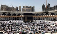 Muslim pilgrims pray at the Grand Mosque, ahead of the annual Hajj pilgrimage in the Muslim holy city of Mecca, Saudi Arabia, on September 3, 2017. Members of Canada's Muslim community say recent tensions between Ottawa and Saudi Arabia are limiting some people's ability to perform what's seen in the faith as a fundamental religious right. They say many currently embarking on hajj, a pilgrimage to the holy city of Mecca in Saudi Arabia, are anxious about their travel arrangements in light of the simmering spat, which has seen the country's state airline cancel flights to and from Canada. THE CANADIAN PRESS/AP, Khalil Hamra
