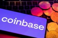 FILE PHOTO: A smartphone with displayed Coinbase logo and representation of cryptocurrencies are placed on a keyboard in this illustration taken, June 8, 2023. REUTERS/Dado Ruvic/Illustration//File Photo