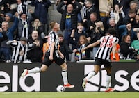 Newcastle United's Harvey Barnes celebrates scoring during the English Premier League soccer match between Newcastle United and West Ham at St. James' Park, Newcastle upon Tyne, England, Saturday March 30, 2024. (Richard Sellers/PA via AP)