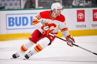 Nov 24, 2023; Dallas, Texas, USA; Calgary Flames center Blake Coleman (20) skates against the Dallas Stars during the third period at the American Airlines Center. Mandatory Credit: Jerome Miron-USA TODAY Sports