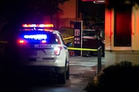 FILE Ñ A police car on Oct. 4, 2018, sits in the McDonaldÕs drive-through in the Bronx where Sylvester Zottola was fatally shot in a plot hatched by his son Anthony.  The younger Zottola was convicted last year of murder-for-hire and conspiracy, and on Friday, April 14, 2023, a federal judge sentenced him to life in prison, the mandatory minimum. (Gregg Vigliotti/The New York Times)
