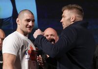 Sean Strickland, left, UFC middleweight champion and Dricus Du Plessis face-off after holding a press conference ahead of UFC 297 in Toronto on Thursday, Jan. 18, 2024.THE CANADIAN PRESS/Nathan Denette
