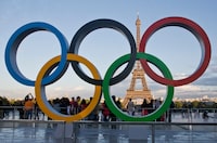 FILE - The Olympic rings are set up in Paris, France, Thursday, Sept. 14, 2017. Olympic organizers from Australia said Wednesday, June 28, 2023 they have safeguards in place to stop the 2032 Brisbane Games joining Paris, Tokyo and Rio de Janeiro under investigation for financial wrongdoing. One week after Paris authorities raided offices and homes linked to organizing the 2024 Olympics, Brisbane officials were at the IOC in Switzerland for a first detailed progress meeting on their own project. (AP Photo/Michel Euler, File)