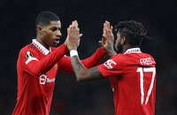 Manchester United's Fred celebrates scoring a goal with Marcus Rashford against FC Barcelona in a Europa League game on Feb. 23.