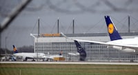 FILE PHOTO: FILE PHOTO: The tail of a Lufthansa airplane is seen outside a Lufthansa Technik maintenance hangar at Munich airport in Germany, April 18, 2019. REUTERS/Michael Dalder/File Photo