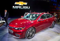 FILE - The 2016 Chevrolet Malibu Hybrid is introduced at the New York International Auto Show, April 1, 2015. The Malibu, the last midsize car made by a Detroit automaker, is heading for the junkyard. General Motors confirmed Thursday, May 9, 2024, that it will stop making the car introduced in 1964 as the company focuses more on electric vehicles. (AP Photo/Bebeto Matthews, File)