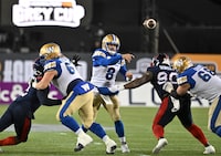 Nov 19, 2023; Hamilton, Ontario, CAN;  Winnipeg Blue Bombers quarterback Zach Collaros (8) throws a pass against the Montreal Alouettes in the first half at Tim Hortons Field. Mandatory Credit: Dan Hamilton-USA TODAY Sports