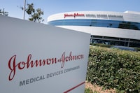 (FILES) In this file photo an entry sign to the Johnson & Johnson campus shows their logo in Irvine, California on August 28, 2019. - President Joe Biden's administration anticipates distributing at least three million doses of Johnson & Johnson's Covid-19 vaccine should it receive emergency use authorization (EUA), White House Coronavirus Response Coordinator Jeff Zients said on February 24, 2021. "If an EUA is issued, we anticipate allocating three to four million doses of Johnson and Johnson vaccine next week," he said. (Photo by Mark RALSTON / AFP) (Photo by MARK RALSTON/AFP via Getty Images)