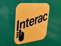 Interac Corp. is broadening the range of financial institutions that can participate in its e-transfer service. The Interac logo is shown in Toronto on Wednesday, Aug. 23, 2023. THE CANADIAN PRESS/Joe O'Connal