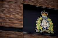 The RCMP logo is seen outside Royal Canadian Mounted Police "E" Division Headquarters, in Surrey, B.C., on April 13, 2018. THE CANADIAN PRESS/Darryl Dyck