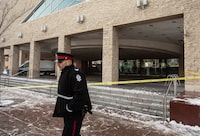 Edmonton Police were investigating a shooting Tuesday at City Hall, where a Molotov cocktail was also thrown from the building's second floor. A police officer is seen at City Hall during an investigation, in Edmonton, Tuesday, Jan. 23, 2024. THE CANADIAN PRESS/Jason Franson