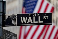 The Wall Street sign is pictured at the New York Stock Exchange (NYSE) in March of 2020.