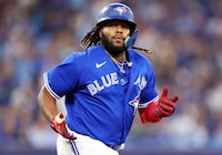 TORONTO, ON - APRIL 11:  Vladimir Guerrero Jr. #27 of the Toronto Blue Jays reacts after flying out in the eighth inning against the Detroit Tigers at Rogers Centre on April 11, 2023 in Toronto, Ontario, Canada.  (Photo by Vaughn Ridley/Getty Images)