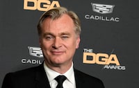 Christopher Nolan, director of the film "Oppenheimer," poses backstage after winning the DGA Award for Theatrical Feature Film at the 76th DGA Awards, Saturday, Feb. 10, 2024, in Beverly Hills, Calif. (AP Photo/Chris Pizzello)