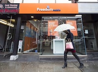 <div>Teamsters Canada says retail and call centre workers at Freedom Mobile across the country have unionized after a six-month organizing drive and negotiated their first collective agreement. A women walks past the new rebranding sign of Freedom Mobile in Toronto, Thursday, Nov. 24, 2016. THE CANADIAN PRESS/Nathan Denette</div>