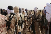 (FILES) Tuaregs fighters of the Coordination of Movements of the Azawad (CMA) gather near Kidal, northern Mali on September 28, 2016, where rival groups have clashed in recent weeks over the country's shaky peace deal. The ex-rebels from the Coordination of Azawad Movements (CMA) in northern Mali said on September 11, 2023 they were in a "time of war" with the ruling junta, in a statement received by AFP. The CMA, an alliance of Tuareg-dominated groups seeking autonomy or independence from the Malian state that was signatory to a 2015 peace deal, called on all residents of Azawad to "go to the field to contribute to the war effort" in a statement also distributed on social media networks. (Photo by STRINGER / AFP) (Photo by STRINGER/AFP via Getty Images)