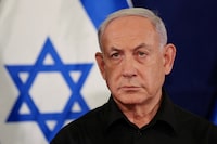 FILE PHOTO: Israeli Prime Minister Benjamin Netanyahu holds a press conference with Defense Minister Yoav Gallant and Cabinet Minister Benny Gantz (not pictured) in the Kirya military base in Tel Aviv , Israel , 28 October  2023.    ABIR SULTAN POOL/Pool via REUTERS/File Photo