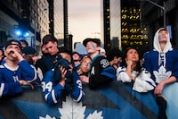 Toronto Maple Leafs fans react as they gather  in Maple Leaf Square to watch second round NHL Stanley Cup playoff hockey action against the Florida Panthers in Toronto, on Wednesday, May 10, 2023. THE CANADIAN PRESS/Christopher Katsarov