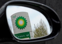 A British Petroleum (BP) logo is seen reflected in a car mirror at a petrol station in south London April 27, 2010.