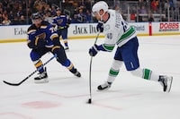 ST LOUIS, MO - FEBRUARY 23: Elias Pettersson #40 of the Vancouver Canucks shoots the game-winning goal against Justin Faulk #72 of the St. Louis Blues in overtime at Enterprise Center on February 23, 2023 in St Louis, Missouri. (Photo by Dilip Vishwanat/Getty Images)