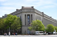 (FILES) The Department of Justice in Washington, DC, on April 16, 2019. A former US Army sergeant was arrested on October 6, 2023, for seeking to provide classified information to China, the Justice Department said. Joseph Daniel Schmidt, 29, who served in an army intelligence unit from 2015 until 2020, is charged with retaining national defense information and attempting to deliver it to China. The Justice Department said Schmidt, after leaving the military, offered national defense information to the Chinese consulate in Turkey and the Chinese security services. (Photo by MANDEL NGAN / AFP) (Photo by MANDEL NGAN/AFP via Getty Images)