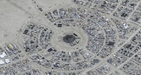 In this satellite photo provided by Maxar Technologies, an overview of Burning Man festival in Black Rock, Nev on Monday, Aug. 28, 2023. (©2023 Maxar Technologies via AP)