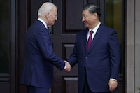 FILE - President Joe Biden greets China's President President Xi Jinping at the Filoli Estate in Woodside, Calif., Nov, 15, 2023, on the sidelines of the Asia-Pacific Economic Cooperative conference. Biden and Xi spoke Tuesday in their first call since their November summit in California, Chinese state media reported. (Doug Mills/The New York Times via AP, Pool, File)