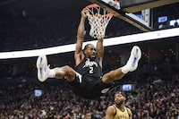 Los Angeles Clippers forward Kawhi Leonard (2) dunks during first half NBA basketball action against the Toronto Raptors, in Toronto on Friday, January 26, 2024. THE CANADIAN PRESS/Christopher Katsarov