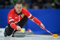 Canada skip Brad Gushue delivers a rock while playing Saskatchewan during the final at the Brier, in Regina, Sunday, March 10, 2024. THE CANADIAN PRESS/Darryl Dyck