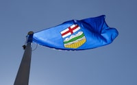 Alberta's provincial flag flies on a flag pole in Ottawa, Monday July 6, 2020. The panel hearing feedback on whether Alberta should quit the Canada Pension Plan heard multiple callers tell them Thursday it’s time to embrace a “no-brainer” provincial program. THE CANADIAN PRESS/Adrian Wyld
