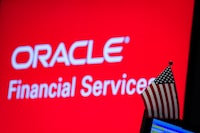 The logo for Oracle financial services is displayed on a screen on the floor at the New York Stock Exchange (NYSE) in New York, U.S., May 3, 2019. REUTERS/Brendan McDermid