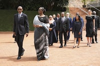 Rwandan President Paul Kagame, left, and his wife, first lady Jeannette Kagame lead other dignitaries as they arrive for a ceremony to mark the 30th anniversary of the Rwandan genocide, held at the Kigali Genocide Memorial, in Kigali, Rwanda, Sunday, April 7, 2024. Rwandans are commemorating 30 years since the genocide in which an estimated 800,000 people were killed by government-backed extremists, shattering this small east African country that continues to grapple with the horrific legacy of the massacres. (AP Photo/Brian Inganga)