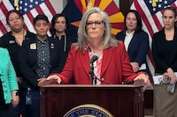 Arizona Gov. Katie Hobbs speaks to reporters at the state Capitol in Phoenix on Tuesday, April 9, 2024. (AP Photo/Jonathan Copper)