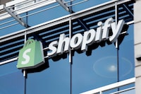The company logo hangs on the Ottawa headquarters of Shopify on May 29, 2019.