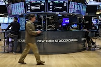 Traders work on the floor at the New York Stock Exchange (NYSE) on Nov. 17.