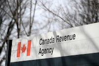 Tax filing season has officially kicked off as Monday marks the first day that Canadians can begin filing their income tax and benefit returns online. A Canada Revenue Agency sign in Ottawa is shownn on Monday, March 1, 2021. THE CANADIAN PRESS/Justin Tang