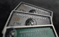 FILE PHOTO: Credit cards of American Express are photographed in this illustration picture at an office in Frankfurt, Germany, March 17, 2016.    REUTERS/Kai Pfaffenbach/File Photo
