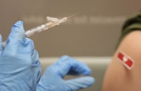 Doctors say it's important to get the updated version of the COVID-19 vaccine, which offers protection against the XBB.1.5 subvariant driving a current rise in cases. A pharmacist prepares to administer a Moderna Spikevax COVID-19 vaccine at a CVS, Wednesday, Sept. 20, 2023, in Cypress, Texas. THE CANADIAN PRESS/Melissa Phillip-Houston Chronicle via AP