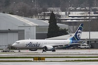 PORTLAND, OREGON - JANUARY 9: Alaska Airlines Boeing 737 MAX 9 aircraft N705AL is seen grounded at Portland International Airport on January 9, 2024 in Portland, Oregon. NTSB investigators are continuing their inspection on the Alaska Airlines N704AL Boeing 737 MAX 9 aircraft following a midair fuselage blowout on Friday, January 5. None of the 171 passengers and six crew members were seriously injured. (Photo by Mathieu Lewis-Rolland/Getty Images)