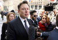 FILE PHOTO: Tesla CEO Elon Musk arrives at Manhattan federal court for a hearing on his fraud settlement with the Securities and Exchange Commission (SEC) in New York City, U.S. April 4, 2019.  REUTERS/Brendan McDermid/File Photo