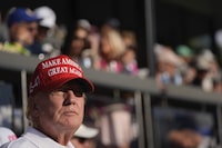 Republican presidential candidate, former President Donald Trump watches play on the 18th hole in the final round of LIV Golf Miami, at Trump National Doral Golf Club, Sunday, April 7, 2024, in Doral, Fla. (AP Photo/Rebecca Blackwell)