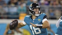 Jacksonville Jaguars quarterback Nathan Rourke (18) in action during an NFL pre-season football game against the Miami Dolphins, Saturday, Aug. 26, 2023, in Jacksonville, Fla. The Jaguars defeated the Dolphins 31-18. (AP Photo/Gary McCullough)