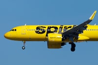 FILE PHOTO: A Spirit commercial airliner prepares to land at San Diego International Airport in San Diego, California, U.S., January 18, 2024.   REUTERS/Mike Blake/File Photo