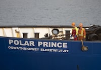 Crew members of the Polar Prince prepare to dock the ship as it arrives at the Coast Guard wharf, Saturday, June 24, 2023 in St. John’s, Nfld.