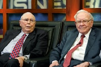 Berkshire Hathaway Chairman and CEO Warren Buffett, right, and his Vice Chairman Charlie Munger, left, speak during an interview in Omaha, Neb., Monday, May 7, 2018, with Liz Claman on Fox Business Network's "Countdown to the Closing Bell".