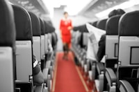 Air Travel with seats and cabin crew in background


		Collection:
iStockphoto
		Item number:
117640297
		Title:
Air Travel with seats and cabin crew in background
		License type:
Royalty-free
		Max file size (JPEG):
9.2 x 6.1 in (2,750 x 1,826 px) / 300 dpi 
		Release info:
No release required
Keywords:
Adult, Air Vehicle, Airplane, Airport, Black, Business Travel, Cabin, Cabin Crew, Color Image, Commercial Airplane, Crew, Design, Economy Class, Flying, Gray, Horizontal, In A Row, Lighting Equipment, Mid-Air, Mode of Transport, Modern, On The Move, Passenger, People, Photography, Portability, Red, Service, Sitting, Sky, Sparse, Tourism, Transportation, Travel, Vanishing Point, Vehicle Interior, Vehicle Seat, Women