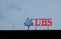 FILE PHOTO: A UBS logo is seen next to Credit Suisse at the Bahnhofstrasse before a news conference of Swiss bank UBS in Zurich Switzerland, August 30, 2023.  REUTERS/Denis Balibouse/File Photo
